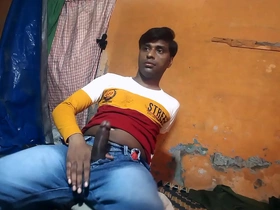 A naked teenage boy with black hair and a hard cock.