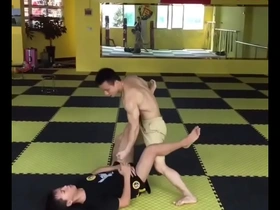 Kicking and slapping the balls of Asian twinks