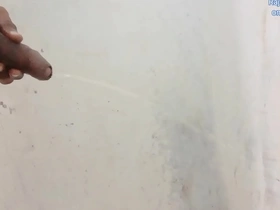 Asian amateur Rajeshplayboy993s bathroom adventure with urination and handjob