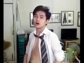 A beautiful Chinese man undresses and reaches an orgasm.