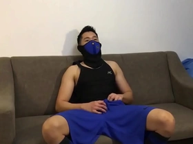 Gay scene with a Chinese handsome boy in a mask.