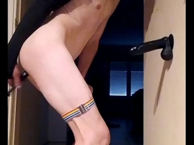 Solo player enjoys anal play with a dildo.