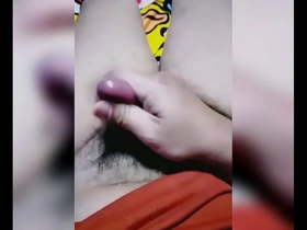 A shy Asian boy reaches his climax while giving a handjob.