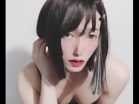 Japanese crossdresser in female attire