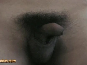Muscular Asian boy in bondage has a big cock and cums hard